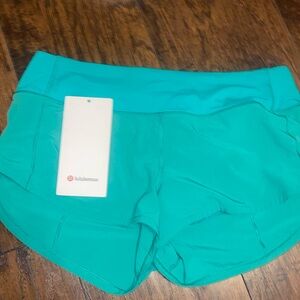 Emerald green lululemon shorts worn once great condition no flaws size 4 lowrise